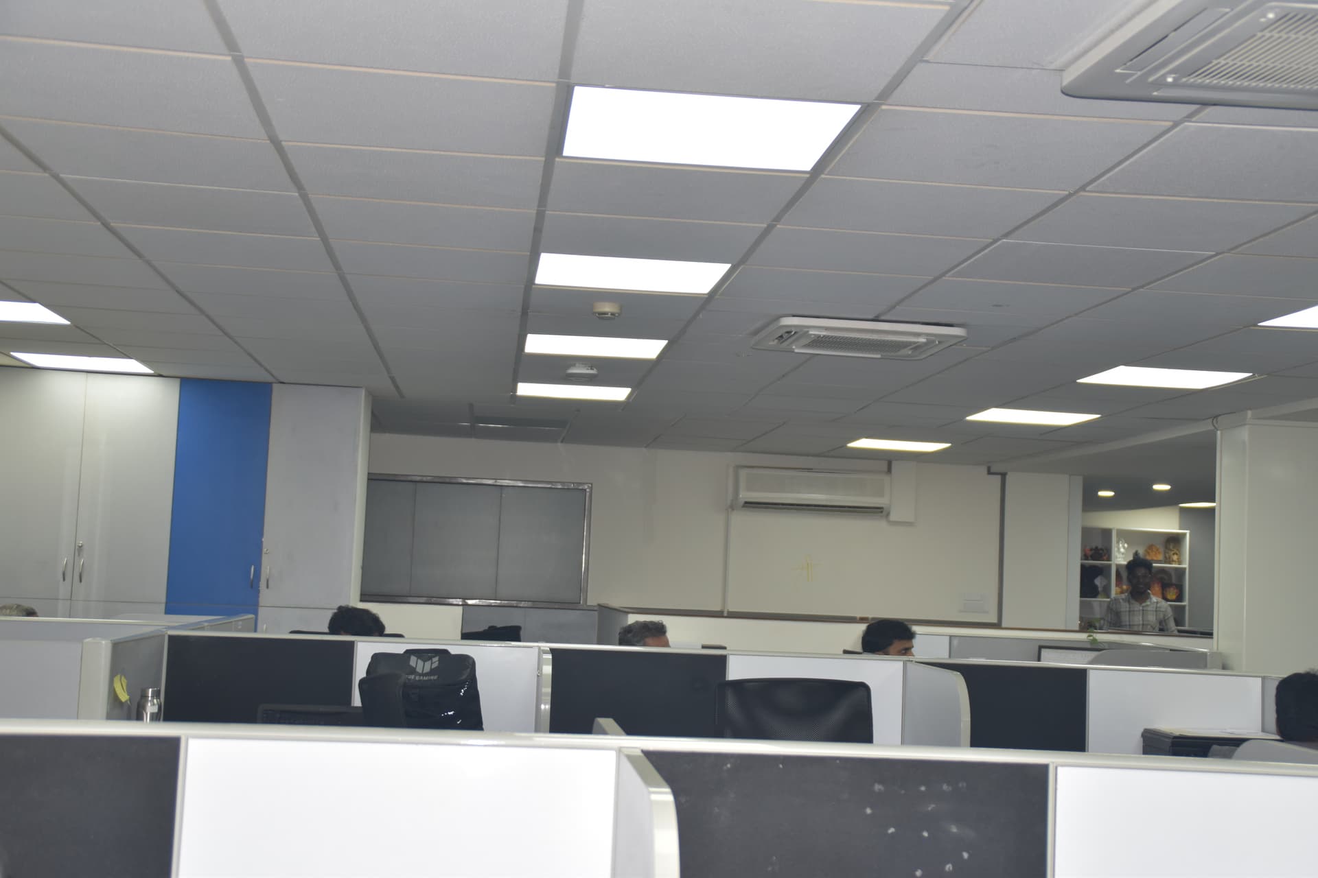Open-plan office floor with Aruba WiFi 6 access point ceiling-mount — Ramanashree Hotels & Resorts, Bengaluru | Layerix Networking Experts